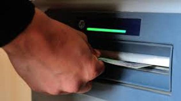 The police suspect the involvement of an inter-state gang who fitted skimming devices and cameras in an ATM of Axis Bank on Charni Road (West). (FILE) The police suspect the involvement of an inter-state gang who fitted skimming devices and cameras in an ATM of Axis Bank on Charni Road (West). (FILE)