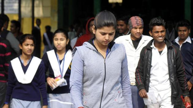 Students coming out after appearing in the UP board exams 2018 at a Centre in Noida  on Tuesday. (Sunil Ghosh / HT file)