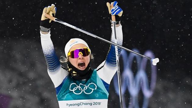 Sweden's Stina Nilsson celebrates as she crosses the finish line to win gold in the women's cross-country individual sprint classic final at the Alpensia cross country ski centre during the Pyeongchang 2018 Winter Olympic Games on February 13, 2018 in Pyeongchang. (AFP) Sweden's Stina Nilsson celebrates as she crosses the finish line to win gold in the women's cross-country individual sprint classic final at the Alpensia cross country ski centre during the Pyeongchang 2018 Winter Olympic Games on February 13, 2018 in Pyeongchang. (AFP)