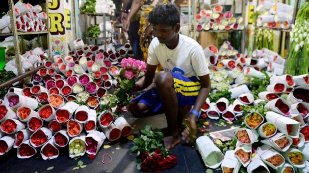 In Chennai, a vendor sorts flowers at a market ahead of the forthcoming Valentines Day celebrations. (Arun Sankar / AFP)