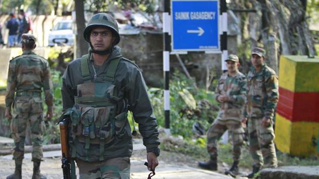 Soldiers patrol carry out a search operation following suspected movement at Domana army camp on the outskirts of Jammu, on February 13, 2018.(AP Photo)