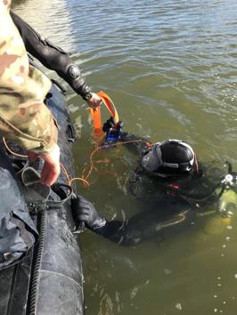 Royal Navy bomb disposal experts and Metropolitan Police officers were called to deal with a World War II bomb found in the King George V Dock, causing the London City Airport to be closed. (Reuters)