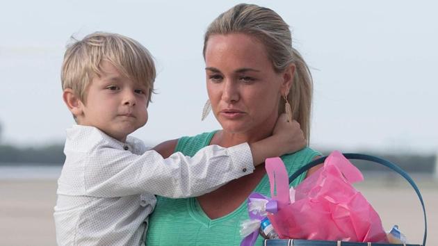 In this file photo, Vanessa Trump, wife of Donald Trump, Jr, holds her son Tristan as they walk off Air Force One at Andrews Air Force Base, MD.(AFP File Photo)