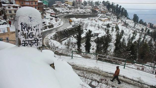 A snow-covered road in Kufri after fresh snowfall near Shimla. Yesterday, Shimla and its nearby areas experienced intermittent spells of rain and snow making it more picturesque. (PTI) A snow-covered road in Kufri after fresh snowfall near Shimla. Yesterday, Shimla and its nearby areas experienced intermittent spells of rain and snow making it more picturesque. (PTI)