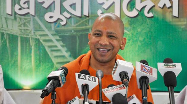 Uttar Pradesh chief minister Yogi Adityanath addresses a press conference at the BJP office in Agartala on Tuesday.(PTI Photo)