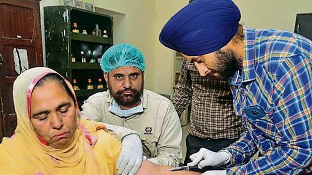 Doctors collecting blood samples of Ranjit Kaur. whose son Jatinder Singh is missing in Iraq, at the forensic lab of Government Medical College, Amritsar, on October 28. (HT File) Doctors collecting blood samples of Ranjit Kaur. whose son Jatinder Singh is missing in Iraq, at the forensic lab of Government Medical College, Amritsar, on October 28. (HT File)