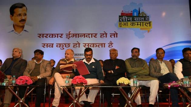 Delhi chief minister Arvind Kejriwal and deputy chief minister Manish Sisodia arrive to attend the three years of AAP government function at the NDMC convention centre in New Delhi.(Arvind Yadav / HT Photo)