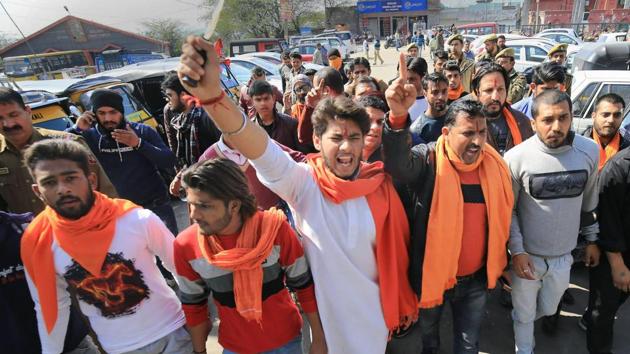 Bajrang Dal activists shout slogans during a protest against Valentine's Day celebrations at Bahu Fort Park in Jammu on Wednesday. (PTI Photo) Bajrang Dal activists shout slogans during a protest against Valentine's Day celebrations at Bahu Fort Park in Jammu on Wednesday. (PTI Photo)