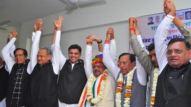 Former CM Ashok Gehlot and state Congress president Sachin Pilot, along with the bypoll winners, at party office in Jaipur on Wednesday. (HT Photo) Former CM Ashok Gehlot and state Congress president Sachin Pilot, along with the bypoll winners, at party office in Jaipur on Wednesday. (HT Photo)