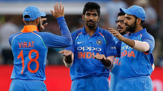 India bowler Jasprit Bumrah (C) celebrates a dismissal during the fifth ODI match between South Africa and India. The Indian cricket team leapfrogged South Africa to claim number-one ranking in the ICC One Day International (ODI) Team Rankings after victory in fifth of the six-match series against South Africa in Port Elizabeth. (Marco Longari / AFP) 
