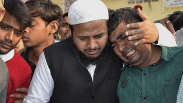 A family member mourns during constable Mujahid Khan’s funeral at Piro in Bhojpur, on Wednesday. Khan, a constable of 49th battalion of CRPF, was killed on February 12, 2018 in a gunfight with terrorists who attempted to strike a CRPF camp in Karan Nagar area of Srinagar. (PTI Photo) A family member mourns during constable Mujahid Khan’s funeral at Piro in Bhojpur, on Wednesday. Khan, a constable of 49th battalion of CRPF, was killed on February 12, 2018 in a gunfight with terrorists who attempted to strike a CRPF camp in Karan Nagar area of Srinagar. (PTI Photo)