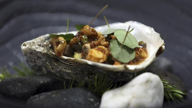 Just down the coast from the Fujairah farm is the Copper Lobster restaurant where, chefs serve the local oysters with Japanese Ponzu sauce. “Being in the industry for 15 years, I had a kind of stereotype... that oysters can only be imported from Europe,” chef Georgiy Danilov said. “In the middle of the year, I just got the business card of Ramie. ... I called him, and I was like: ‘Are you real?’” (Kamran Jebreili / AP) Just down the coast from the Fujairah farm is the Copper Lobster restaurant where, chefs serve the local oysters with Japanese Ponzu sauce. “Being in the industry for 15 years, I had a kind of stereotype... that oysters can only be imported from Europe,” chef Georgiy Danilov said. “In the middle of the year, I just got the business card of Ramie. ... I called him, and I was like: ‘Are you real?’” (Kamran Jebreili / AP)