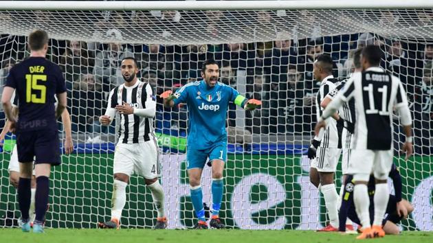 Juventus' goalkeeper from Italy Gianluigi Buffon (C) shouts at his players during the UEFA Champions League round of sixteen first leg football match between against Tottenham Hotspur at The Allianz Stadium in Turin on Tuesday. (AFP) Juventus' goalkeeper from Italy Gianluigi Buffon (C) shouts at his players during the UEFA Champions League round of sixteen first leg football match between against Tottenham Hotspur at The Allianz Stadium in Turin on Tuesday. (AFP)