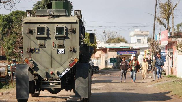 An Indian Army vehicle conduct a search operation outside an army camp in Jammu. (PTI) An Indian Army vehicle conduct a search operation outside an army camp in Jammu. (PTI)