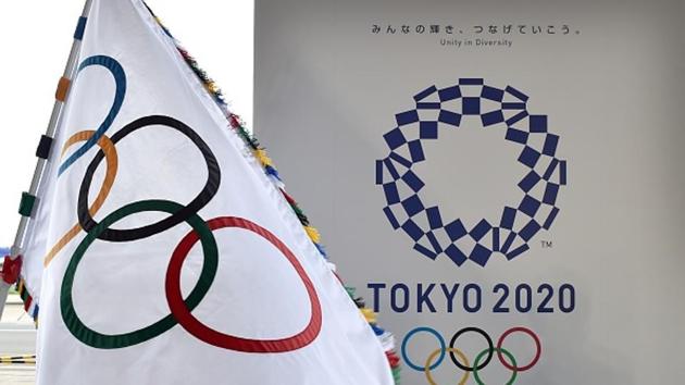 File image of the Olympic flag (left) and the logo of the Tokyo 2020.(AFP/Getty Images)