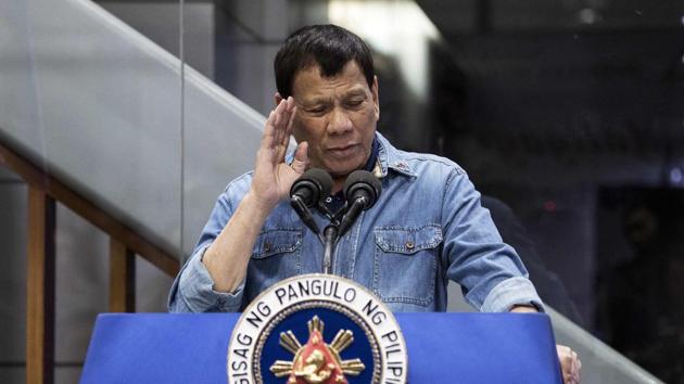 Philippine President Rodrigo Duterte delivers his speech to overseas Filipina workers (OFW) that arrived in Manila from Kuwait are at the Manila International Airport on February 13, 2018. (AFP Photo) Philippine President Rodrigo Duterte delivers his speech to overseas Filipina workers (OFW) that arrived in Manila from Kuwait are at the Manila International Airport on February 13, 2018. (AFP Photo)
