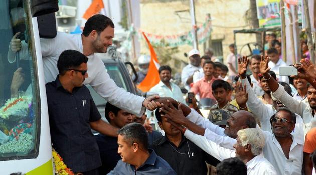 Congress President Rahul Gandhi shakes hands with people during his visit to Kanakagiri, Karnataka on Sunday. (PTI Photo) Congress President Rahul Gandhi shakes hands with people during his visit to Kanakagiri, Karnataka on Sunday. (PTI Photo)