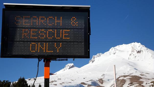 Rescue personnel attend the staging area for rescues underway on Mount Hood, Oregon, US. (REUTERS) Rescue personnel attend the staging area for rescues underway on Mount Hood, Oregon, US. (REUTERS)