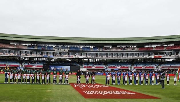 Indian and South African cricket teams stand during the national anthems at the start of the fourth ODI in Port Elizabeth on Tuesday, February 13, 2018.(AP)