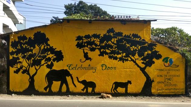 The Dehradun Municipal Corporation in Uttarakhand, has commissioned artists and social organisation to paint walls with graffiti to beautify the city’s urbanscape. (HT Photo.) The Dehradun Municipal Corporation in Uttarakhand, has commissioned artists and social organisation to paint walls with graffiti to beautify the city’s urbanscape. (HT Photo.)