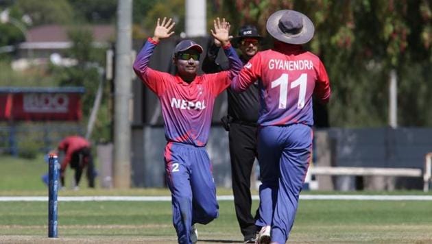 Nepal players celebrate after the fall of a Canadian batsman in a World Cricket League Division Two match.(ICC)