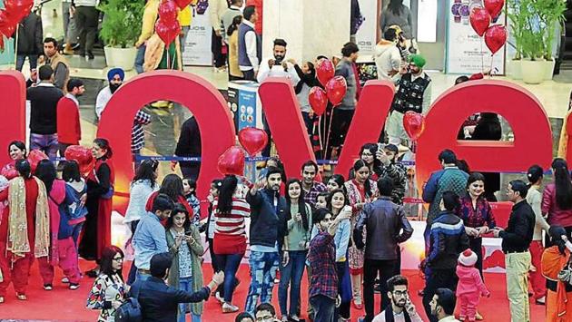 LOVE ALL AROUND: Elante Mall abuzz with activities as youngsters take selfies with the backdrop of ‘Love’ on Valentine’s Day in Chandigarh on Wednesday. (Keshav Singh/HT) LOVE ALL AROUND: Elante Mall abuzz with activities as youngsters take selfies with the backdrop of ‘Love’ on Valentine’s Day in Chandigarh on Wednesday. (Keshav Singh/HT)