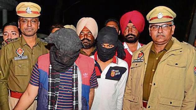 The two accused in police custody in Amritsar on Thursday. (Sameer Sehgal/HT) The two accused in police custody in Amritsar on Thursday. (Sameer Sehgal/HT)