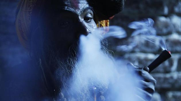 A Hindu sadhu lights up in the courtyard of the Pashupatinath temple on the eve of Mahashivratri in Kathmandu, Nepal. (Niranjan Shrestha / AP) A Hindu sadhu lights up in the courtyard of the Pashupatinath temple on the eve of Mahashivratri in Kathmandu, Nepal. (Niranjan Shrestha / AP)