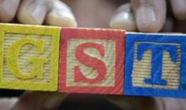 The decision to introduce GST charges along with a fee hike to the existing examination registration fees was hiking the fees by Rs 400-500 per student. (Pic for representation/AFP) The decision to introduce GST charges along with a fee hike to the existing examination registration fees was hiking the fees by Rs 400-500 per student. (Pic for representation/AFP)