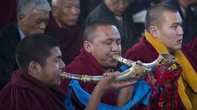 Exiled Tibetan Buddhist monks blow horns during a special prayer session to welcome their New Year called Losar in Dharmsala. Tibetans all over the world celebrated the beginning of this Year of the Earth Dog. (Ashwini Bhatia / AP) Exiled Tibetan Buddhist monks blow horns during a special prayer session to welcome their New Year called Losar in Dharmsala. Tibetans all over the world celebrated the beginning of this Year of the Earth Dog. (Ashwini Bhatia / AP)