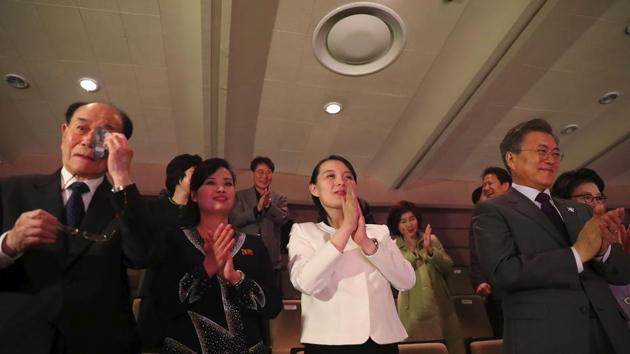 North Korea's ceremonial head of state Kim Yong Nam (L) wipes tears as South Korean President Moon Jae-in (R) and North Korean leader Kim Jong Un's sister Kim Yo Jong (2R), applaud during a concert of Pyongyang's Samjiyon Orchestra in Seoul, as conservative protesters burn the North's national flag outside. (Yonhap / AFP) North Korea's ceremonial head of state Kim Yong Nam (L) wipes tears as South Korean President Moon Jae-in (R) and North Korean leader Kim Jong Un's sister Kim Yo Jong (2R), applaud during a concert of Pyongyang's Samjiyon Orchestra in Seoul, as conservative protesters burn the North's national flag outside. (Yonhap / AFP)