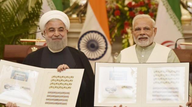 Prime Minister Narendra Modi releasing a commemorative stamp with Iranian President Hassan Rouhani at Hyderabad House in New Delhi on Saturday. (Vipin Kumar/HT Photo) Prime Minister Narendra Modi releasing a commemorative stamp with Iranian President Hassan Rouhani at Hyderabad House in New Delhi on Saturday. (Vipin Kumar/HT Photo)