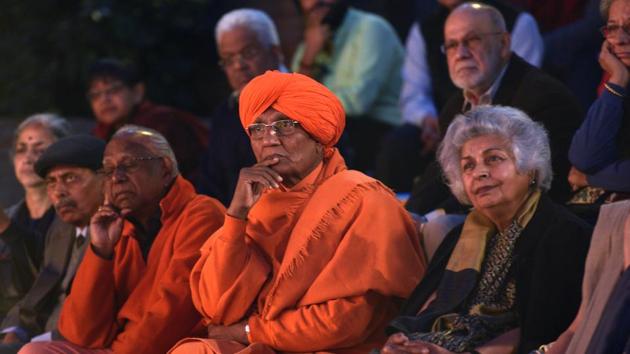 Politician and activist Swami Agnivesh is seen listening to tributes along with others in attendance. (Raj K Raj / HT Photo) 