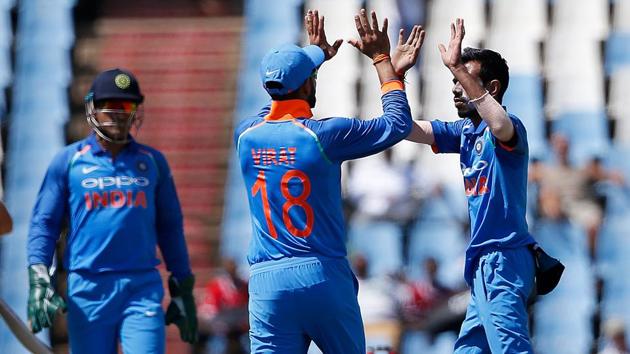 Indian cricket team's Yuzvendra Chahal (R) and captain Virat Kohli with MS Dhoni during the final ODI of the series vs South Africa at Super Sport Park in Centurion on February 16. (AFP) Indian cricket team's Yuzvendra Chahal (R) and captain Virat Kohli with MS Dhoni during the final ODI of the series vs South Africa at Super Sport Park in Centurion on February 16. (AFP)