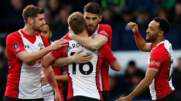 Southampton's Dutch defender Wesley Hoedt (C) celebrates with teammates after scoring the opening goal of the English FA Cup fifth round football match between West Bromwich Albion and Southampton at The Hawthorns stadium in West Bromwich, central England, on February 17, 2018. (AFP) Southampton's Dutch defender Wesley Hoedt (C) celebrates with teammates after scoring the opening goal of the English FA Cup fifth round football match between West Bromwich Albion and Southampton at The Hawthorns stadium in West Bromwich, central England, on February 17, 2018. (AFP)