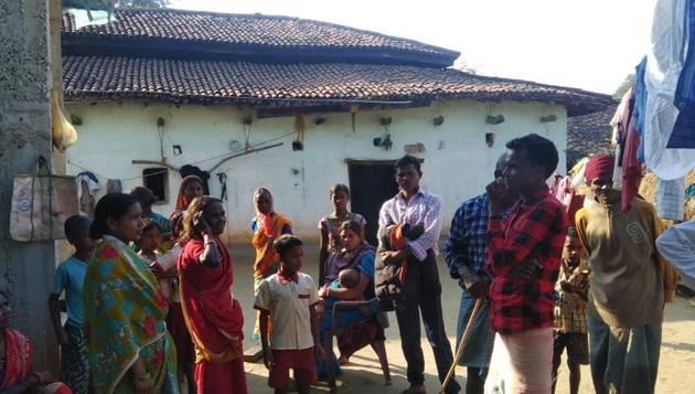 Villagers gather at Dulmi village where two women were tonsured and forced to eat human faecal for allegedly practising witchcraft. (HT Photo) Villagers gather at Dulmi village where two women were tonsured and forced to eat human faecal for allegedly practising witchcraft. (HT Photo)