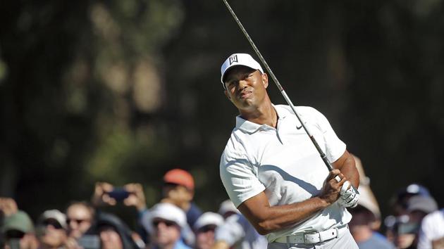 Tiger Woods watches his drive on the second tee in the second round of the Genesis Open golf tournament at Riviera Country Club in the Pacific Palisades neighborhood of Los Angeles on Friday. (AP) Tiger Woods watches his drive on the second tee in the second round of the Genesis Open golf tournament at Riviera Country Club in the Pacific Palisades neighborhood of Los Angeles on Friday. (AP)