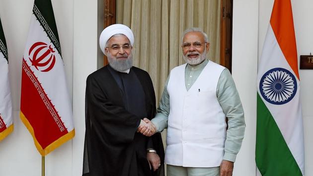 Iranian President Hassan Rouhani (L) shake hands with Indian Prime Minister Narendra Modi before a meeting at Hyderabad house in New Delhi on February 17, 2018.(AFP Photo)