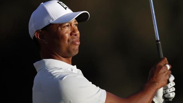 Tiger Woods watches his tee shot on the 16th hole during the second round of the Genesis Open golf tournament at Riviera Country Club on Friday.(AP)