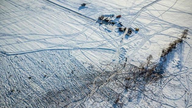 An aerial picture taken in the Ramensky district on the outskirts of Moscow shows emergency rescuers working at the site of the plane crash which occurred the day before. An Antonov An-148 plane went down on February 11, 2018 around 70 kilometres south-east of Moscow killing all 71 aboard. (Dmitry Serebryakov / AFP) An aerial picture taken in the Ramensky district on the outskirts of Moscow shows emergency rescuers working at the site of the plane crash which occurred the day before. An Antonov An-148 plane went down on February 11, 2018 around 70 kilometres south-east of Moscow killing all 71 aboard. (Dmitry Serebryakov / AFP)