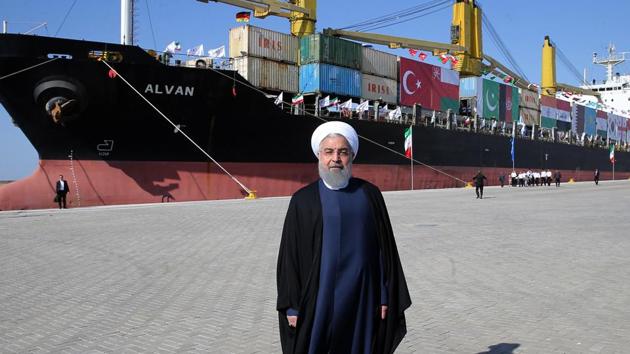 A handout picture provided by the office of Iranian President Hassan Rouhani on December 3, 2017 shows him inaugurating the first phase of Chabahar Port.(AFP Photo)