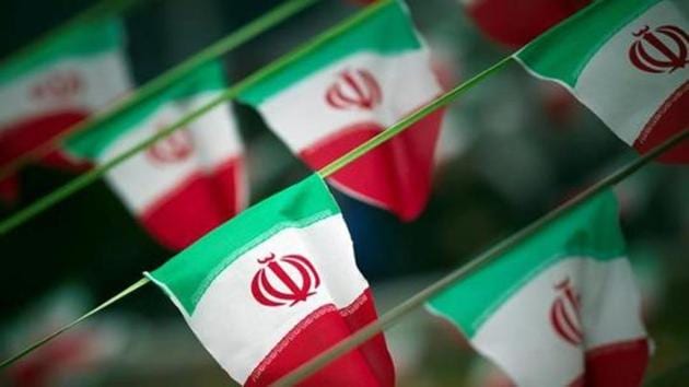 Iran's national flags are seen on a square in Tehran. The country’s media reported a passenger plane on a domestic flight crashed into the Zagros mountains on Sunday.(Reuters File Photo)