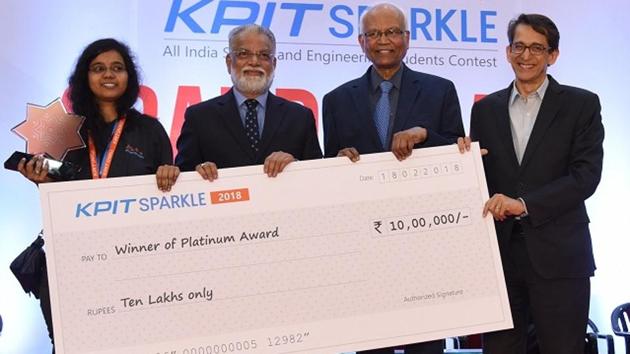 (From left) A member of the platinum award-winning team Electrodes, former ISRO chairman K Radhakrishnan, RA Mashelkar and Ravi Pandit during the KPIT Sparkle 2018. (HT Photo) (From left) A member of the platinum award-winning team Electrodes, former ISRO chairman K Radhakrishnan, RA Mashelkar and Ravi Pandit during the KPIT Sparkle 2018. (HT Photo)