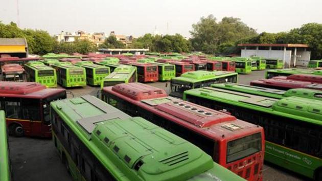 A view of buses parked at Peragarhi DTC bus depot. (HT File Photo) A view of buses parked at Peragarhi DTC bus depot. (HT File Photo)