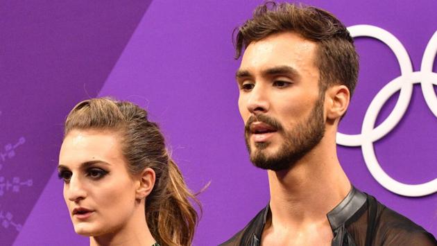 The duo were still able to finish their short dance as Papadakis tried to keep her chest covered, but she left the ice in tears. (AFP) The duo were still able to finish their short dance as Papadakis tried to keep her chest covered, but she left the ice in tears. (AFP)