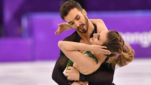 The mishap happened when the 22-year-old Papadakis leaned backwards early on and Cizeron inadvertently unclipped the back of her green costume. (AFP) The mishap happened when the 22-year-old Papadakis leaned backwards early on and Cizeron inadvertently unclipped the back of her green costume. (AFP)