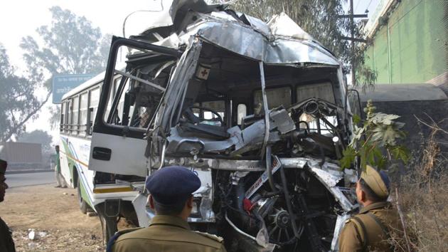 Policemen assess damage to the Rajasthan roadways bus from Jalore that met with an accident on the former NH-58 in Ghaziabad, on Sunday morning. There were 48 passengers, of whom 40 were injured; the bud driver died on the spot. (Sakib Ali/HT Photo) Policemen assess damage to the Rajasthan roadways bus from Jalore that met with an accident on the former NH-58 in Ghaziabad, on Sunday morning. There were 48 passengers, of whom 40 were injured; the bud driver died on the spot. (Sakib Ali/HT Photo)