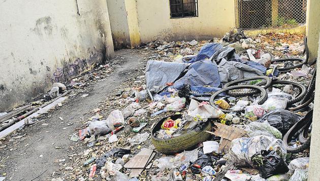 Vacant EWS building on Nagras road, Aundh, has become a garbage dump yard. (HT Photo) Vacant EWS building on Nagras road, Aundh, has become a garbage dump yard. (HT Photo)
