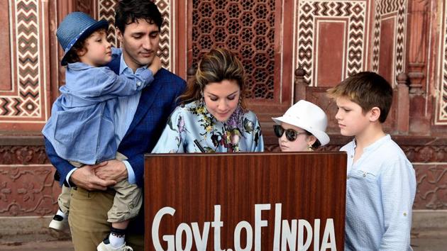 Prime Minister of Canada Justin Trudeau, his wife Sophie Gregoire and their children write on the visitors book during their visit to Taj Mahal in Agra. (Money Sharma / AFP) Prime Minister of Canada Justin Trudeau, his wife Sophie Gregoire and their children write on the visitors book during their visit to Taj Mahal in Agra. (Money Sharma / AFP)