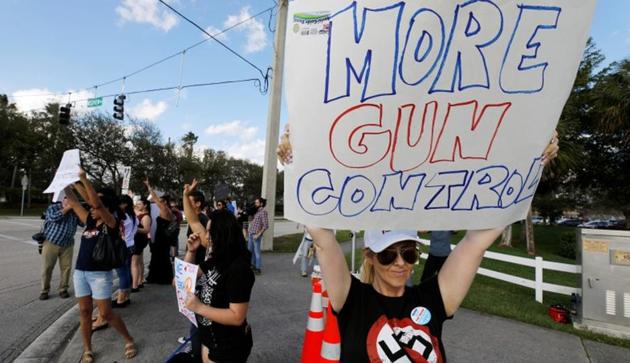 Jennifer Gennaro joins other parents and students in a demonstration calling for more gun control at an intersection near Marjory Stoneman Douglas High School, in Coral Springs, Florida, on February 18. (REUTERS) Jennifer Gennaro joins other parents and students in a demonstration calling for more gun control at an intersection near Marjory Stoneman Douglas High School, in Coral Springs, Florida, on February 18. (REUTERS)